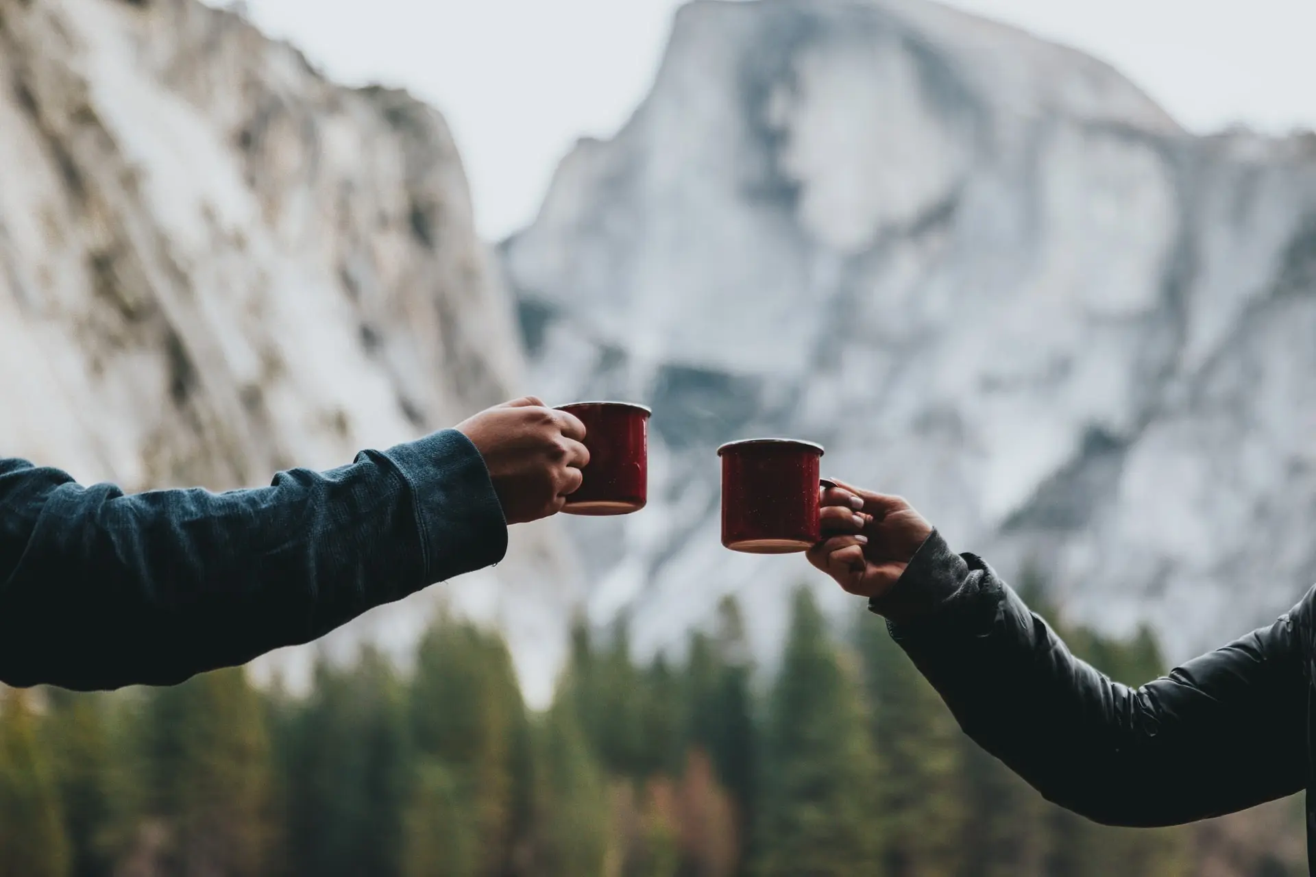 Toasting mugs in the mountains