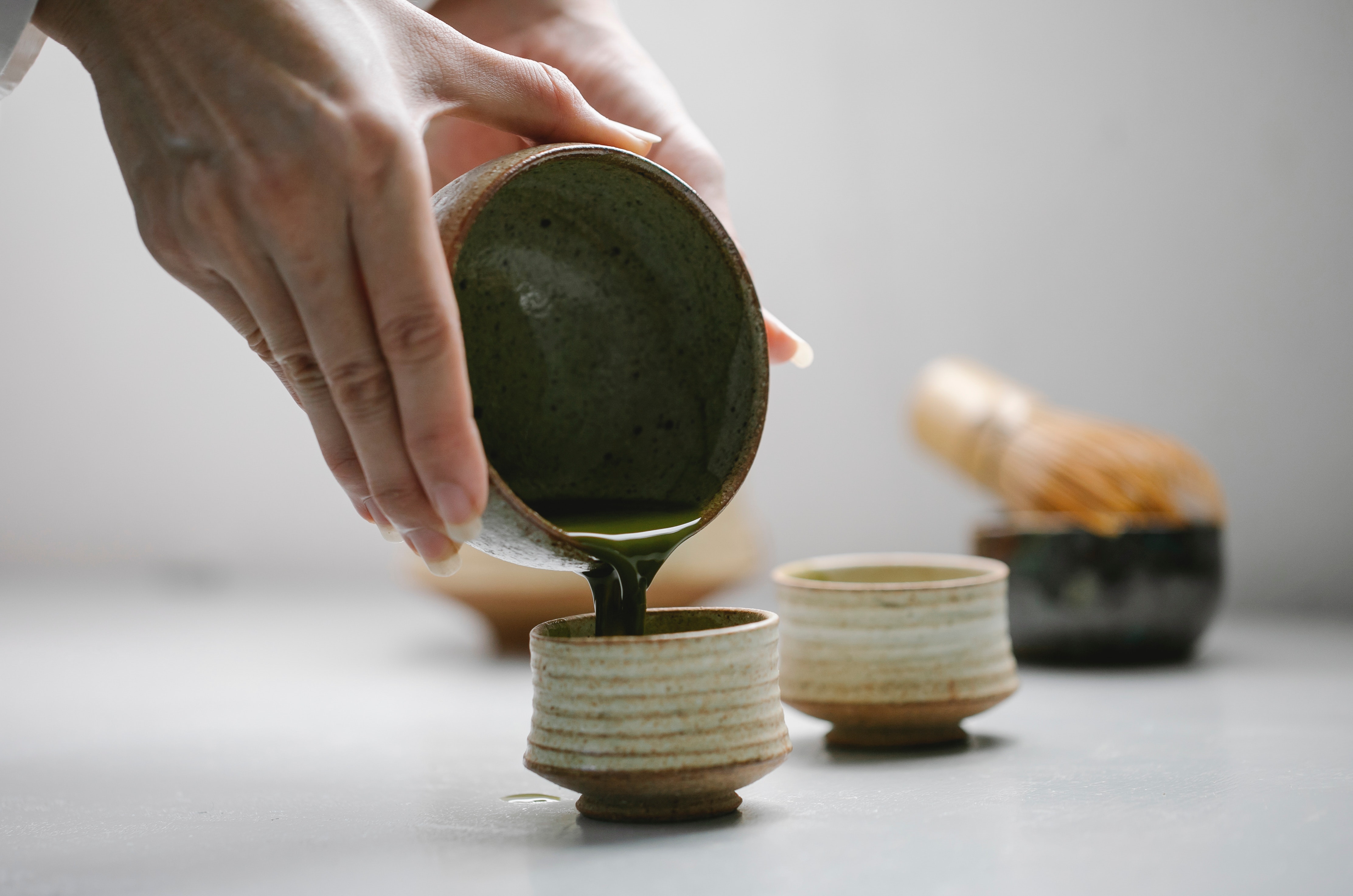 Matcha tea being poured